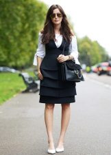 Dress with frills in combination with a blouse