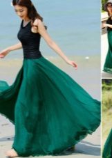 tamsiai žalios spalvos sijonas