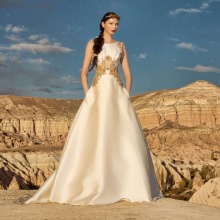 فستان زفاف من توليبيا مع تطريز ذهبي