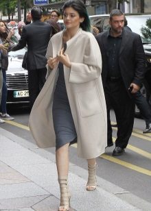 Gray dress in combination with a white coat