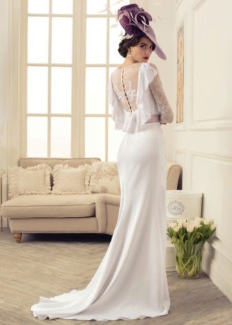 Vestido de novia con tracería abierta de la colección Cansado del lujo de Tatiana Kaplun.