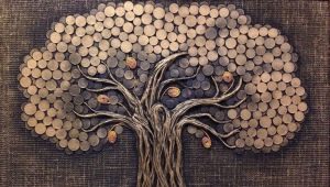 Immagine di un albero di soldi fatto di monete con le proprie mani