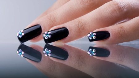 Black manicure with rhinestones - brilliance and mystical mystery