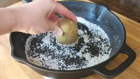 Hoe een gietijzeren koekepan te ontsteken?