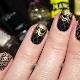 Black manicure with gold: stylish ideas and techniques