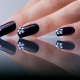 Black manicure with rhinestones - brilliance and mystical mystery