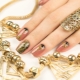 Manicure com elementos de ouro: características de decoração e tendências da moda
