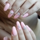 Pink manicure with rhinestones: glitter and femininity
