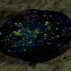 Musta opaali: ulkonäkö, ominaisuudet ja laajuus