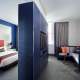Dormitori-sala d'estar: l'elecció de mobles, opcions de planificació i disseny d'interiors
